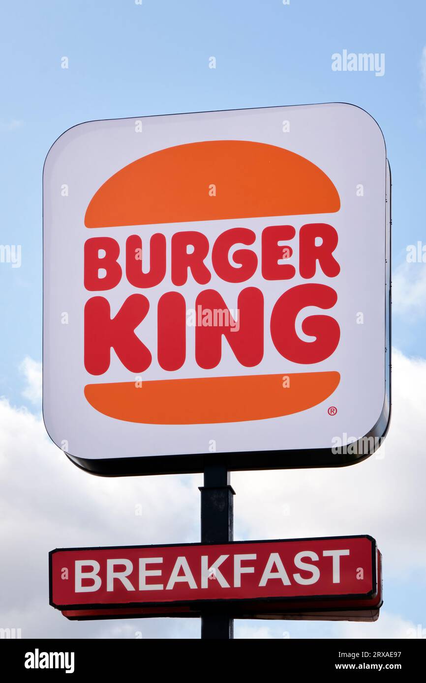 Sign in front of a Burger King restaurant portrait orientation against