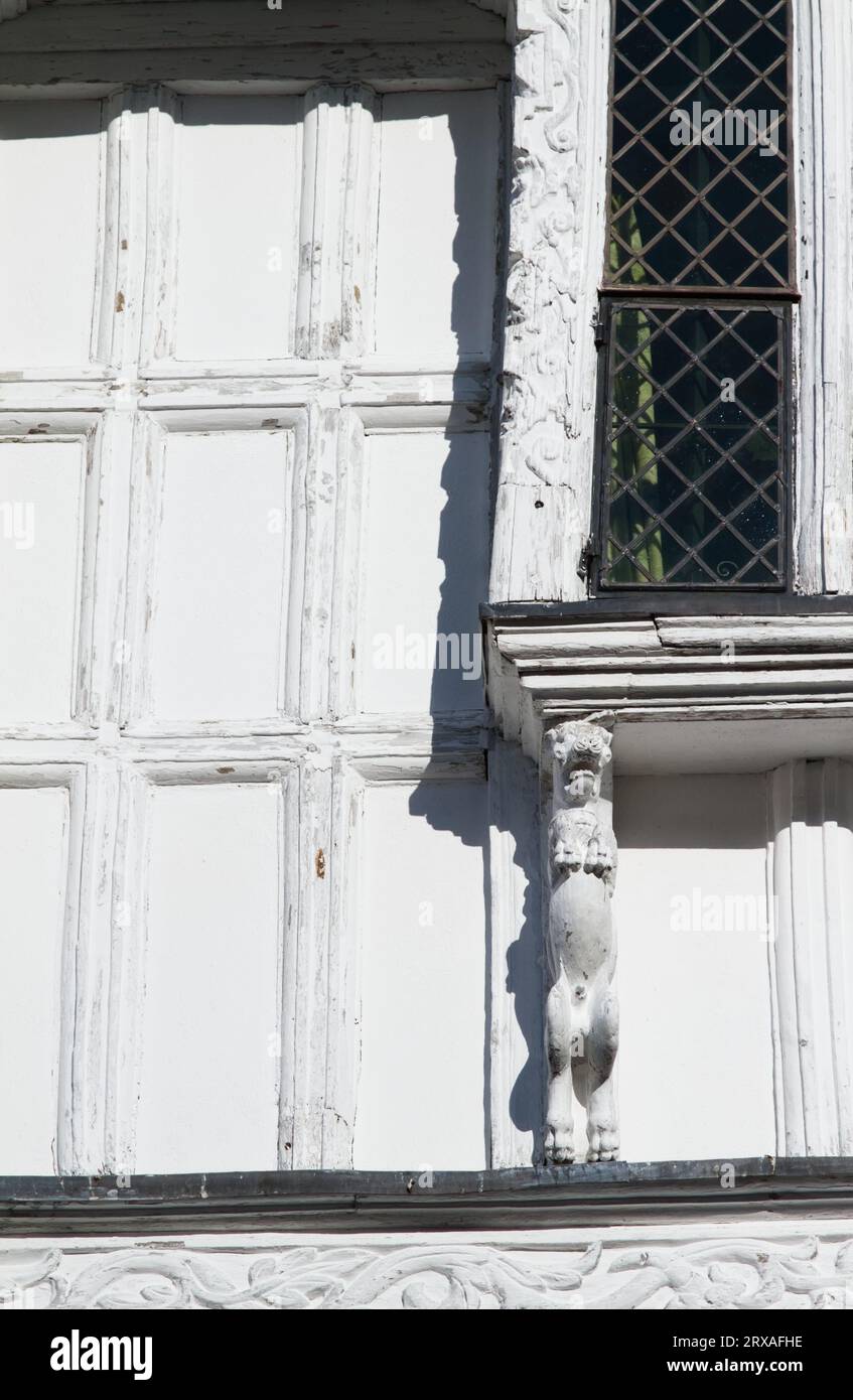 Detail Of The Outside Panelling, Leaded Windows And Scuplted Wood Window Supports Of The 17th Century Merchants House, 5 Higher Street, Dartmouth, UK Stock Photo