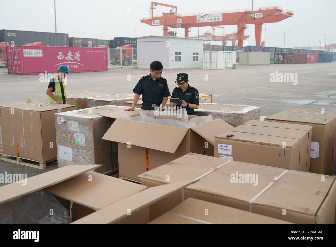 Xi'an, China's Shaanxi Province. 11th Sep, 2023. Customs officers check imported products at Xi'an International Port in Xi'an, northwest China's Shaanxi Province, Sept. 11, 2023. The Chang'an China-Europe freight train service was launched in 2013, when China proposed the Belt and Road Initiative. In the past ten years, Xi'an International Port, the starting station of the Chang'an China-Europe freight trains, has been developed from a small cargo station to an international logistic hub. Credit: Shao Rui/Xinhua/Alamy Live News Stock Photo