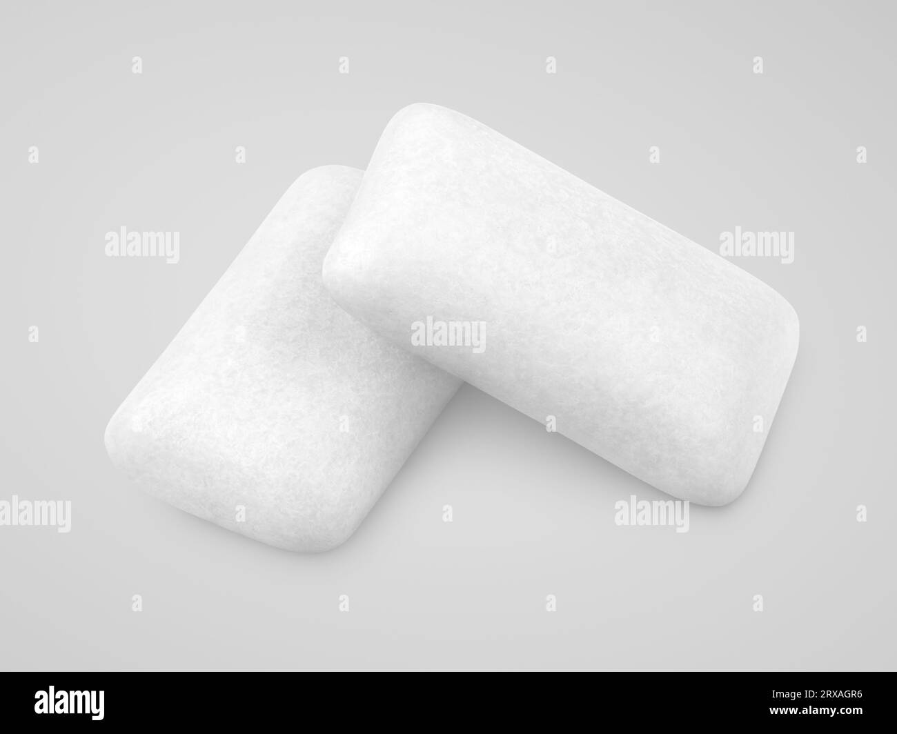 Two pieces of chewing gums on gray background with clipping path Stock