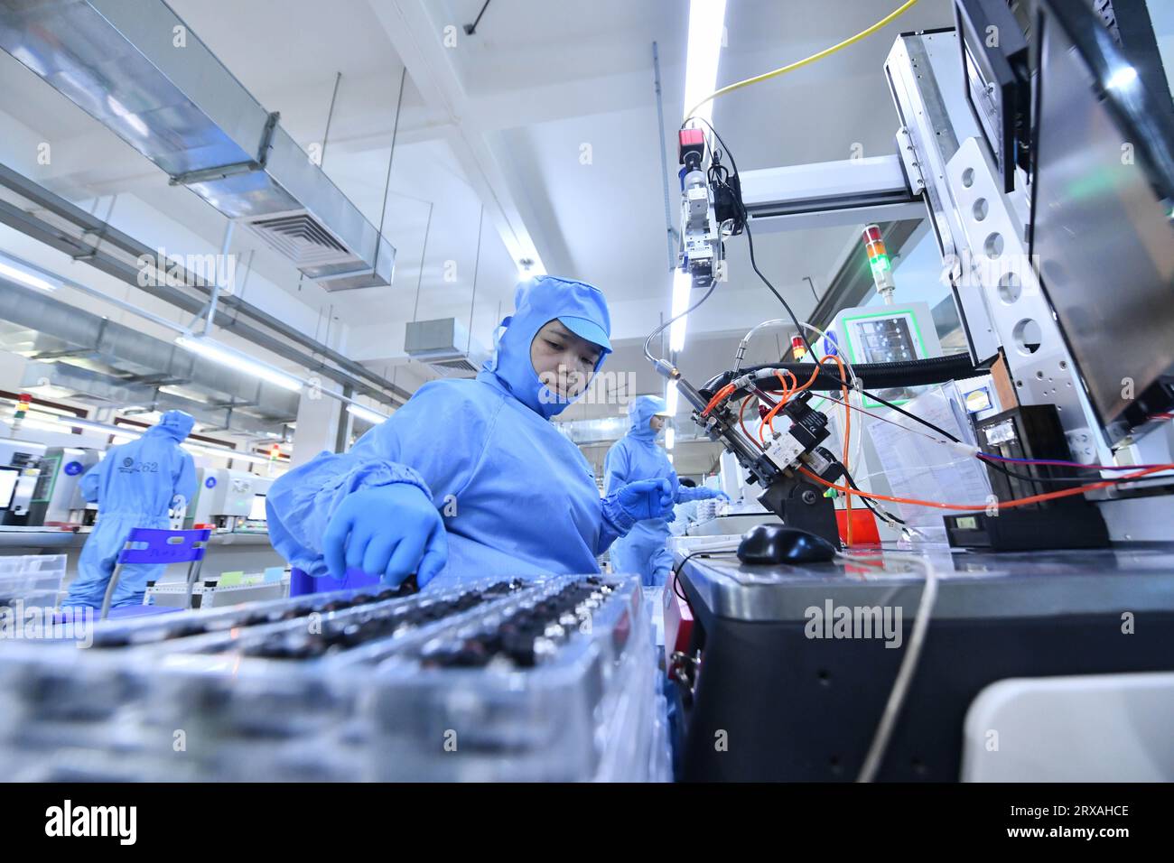 Liuzhou, China's Guangxi Zhuang Autonomous Region. 21st Sep, 2023. Employees work on a production line of Liuzhou Yuanchuang EFI Thecnology Co., Ltd. in Liuzhou City, south China's Guangxi Zhuang Autonomous Region, Sept. 21, 2023. In recent years, Liuzhou has been promoting the cultivation and expansion of emerging industries such as new-energy, intelligent equipment and smart home appliances manufacturing, biomedicine and new-generation information technology. Credit: Huang Xiaobang/Xinhua/Alamy Live News Stock Photo