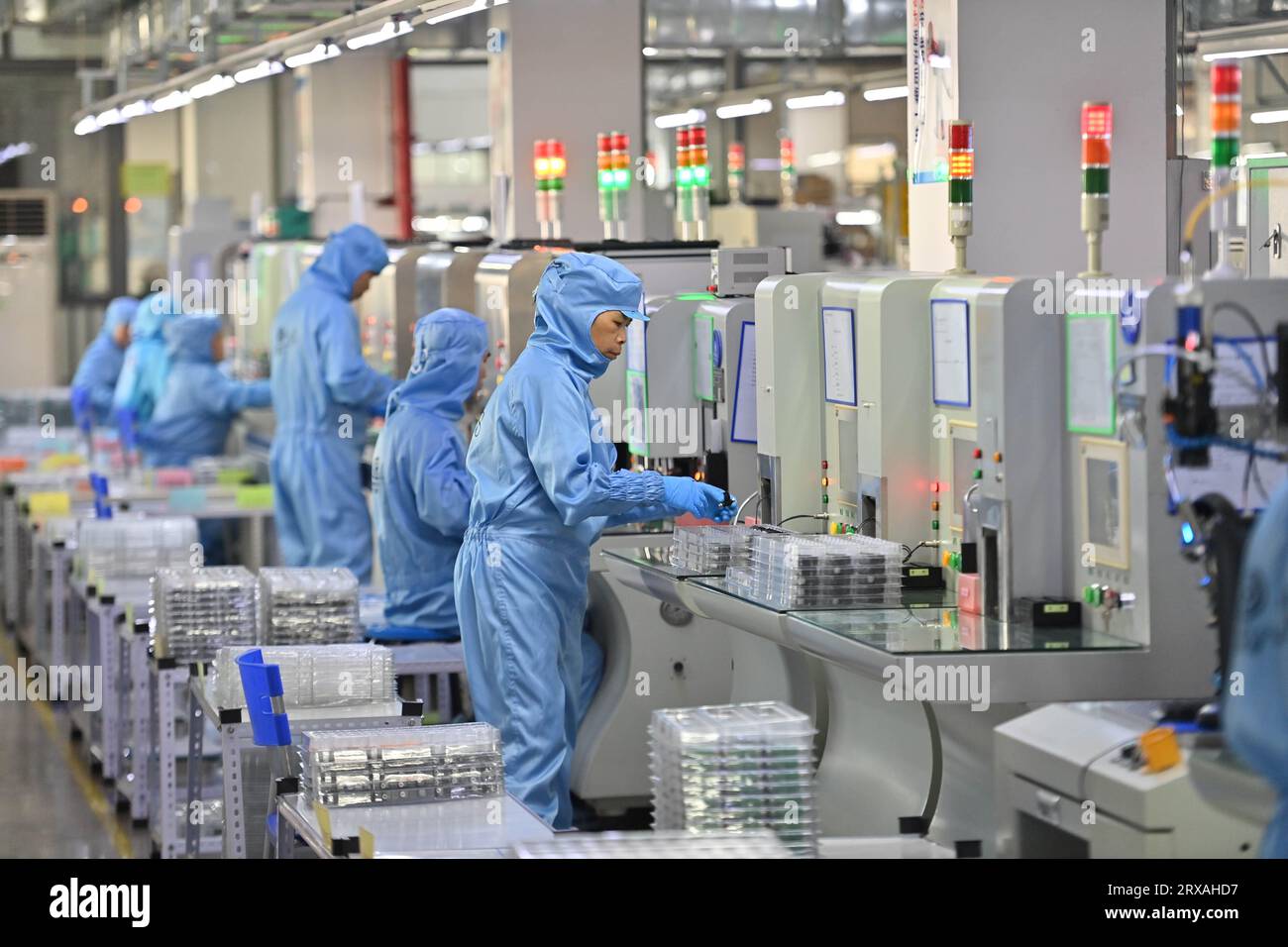 Liuzhou, China's Guangxi Zhuang Autonomous Region. 21st Sep, 2023. Employees work on a production line of Liuzhou Yuanchuang EFI Thecnology Co., Ltd. in Liuzhou City, south China's Guangxi Zhuang Autonomous Region, Sept. 21, 2023. In recent years, Liuzhou has been promoting the cultivation and expansion of emerging industries such as new-energy, intelligent equipment and smart home appliances manufacturing, biomedicine and new-generation information technology. Credit: Huang Xiaobang/Xinhua/Alamy Live News Stock Photo