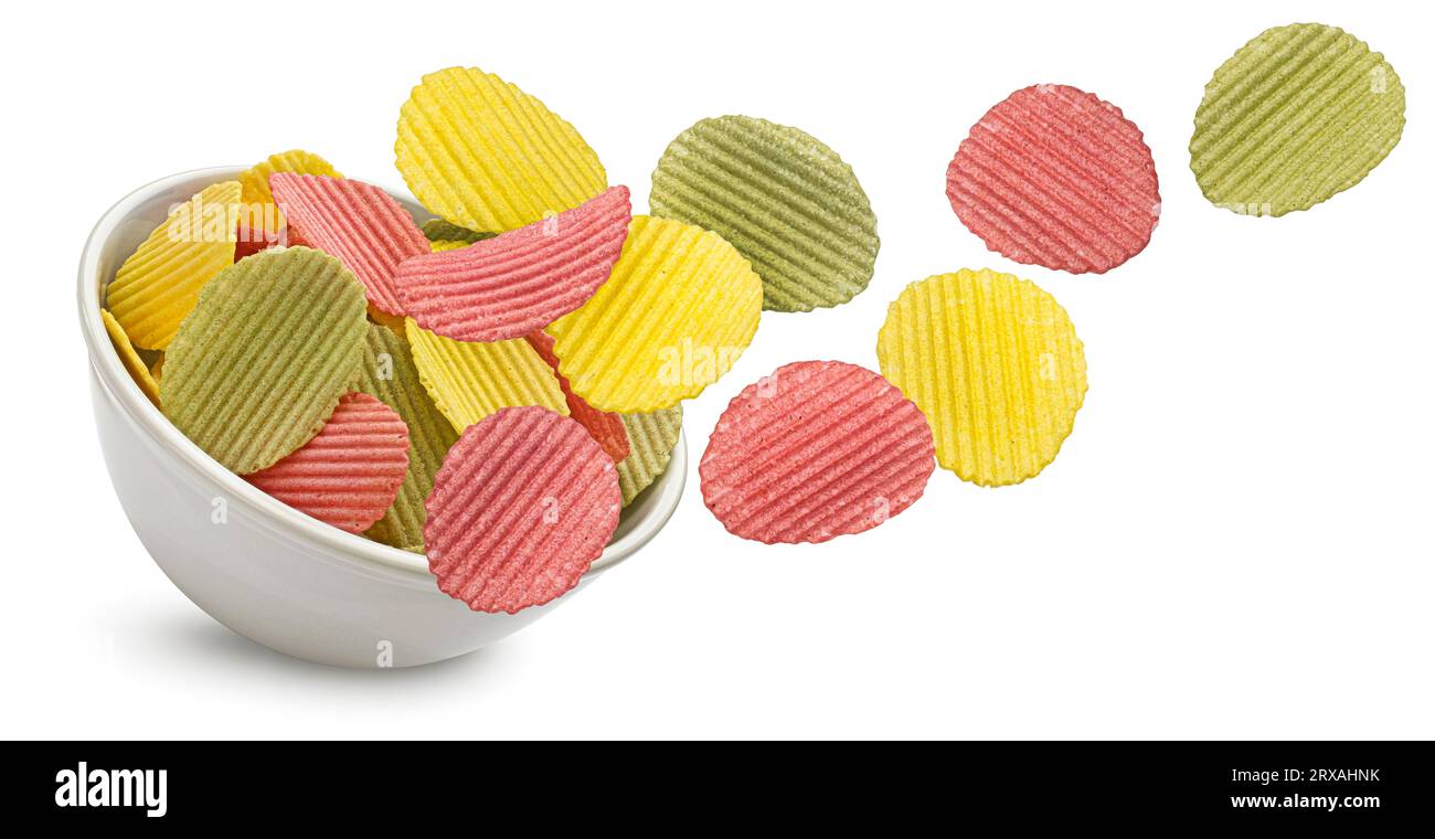 Mix of falling vegetable chips isolated on white background Stock Photo