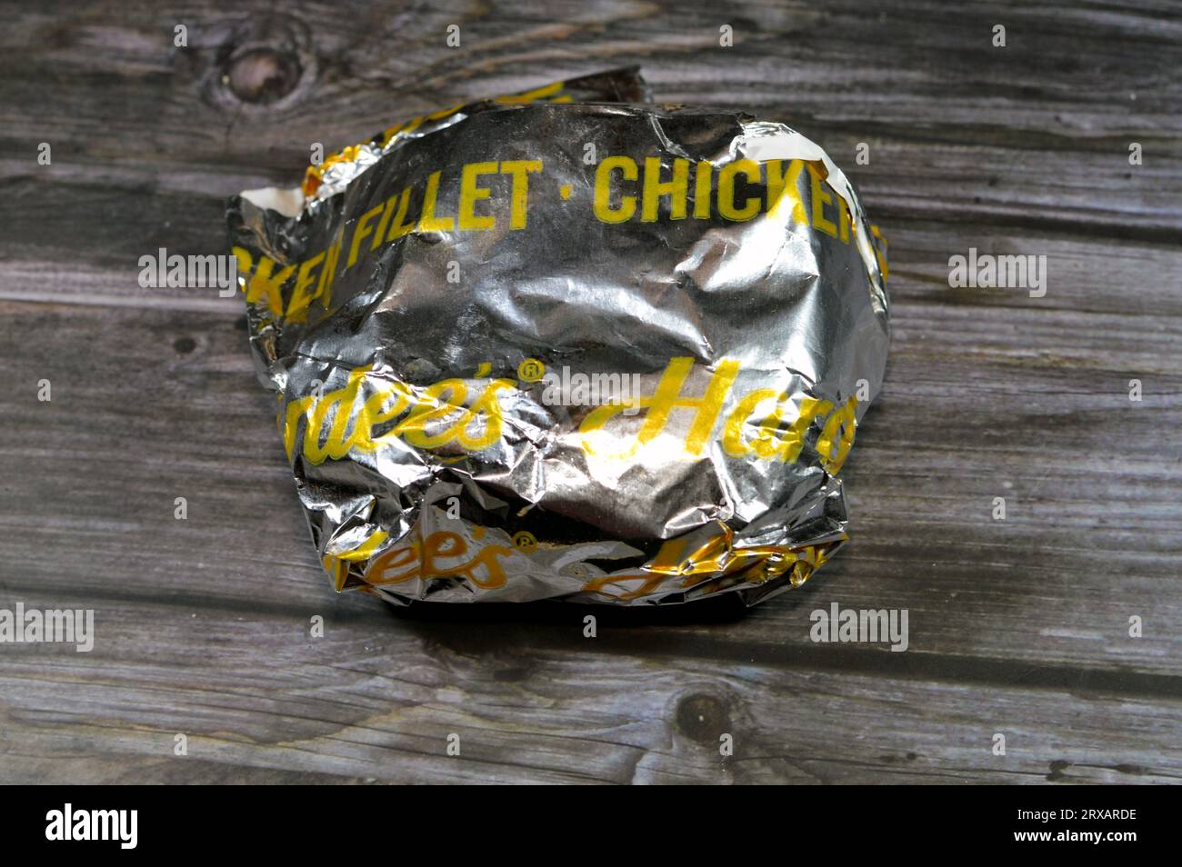 Cairo, Egypt, September 11 2023: Food delivery package of fast junk food  burger buns from Hardee's Hardees, Hardee's Restaurants LLC is an American f Stock Photo