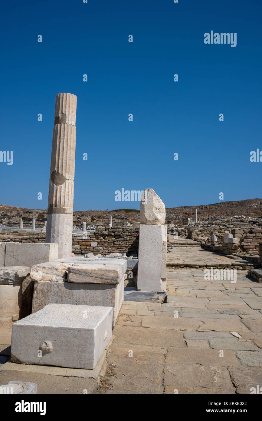 Delos is a Greek island and archaeological site in the Aegean Sea's Cyclades archipelago, near Mykonos. Stock Photo