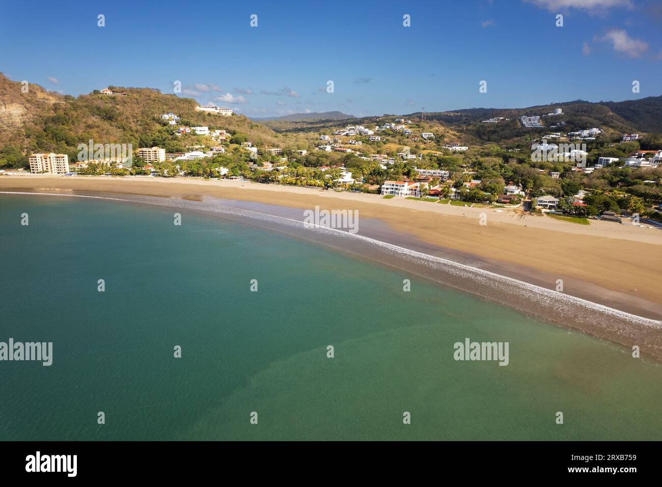 Luxury villas on tropical beach background aerial drone view Stock Photo