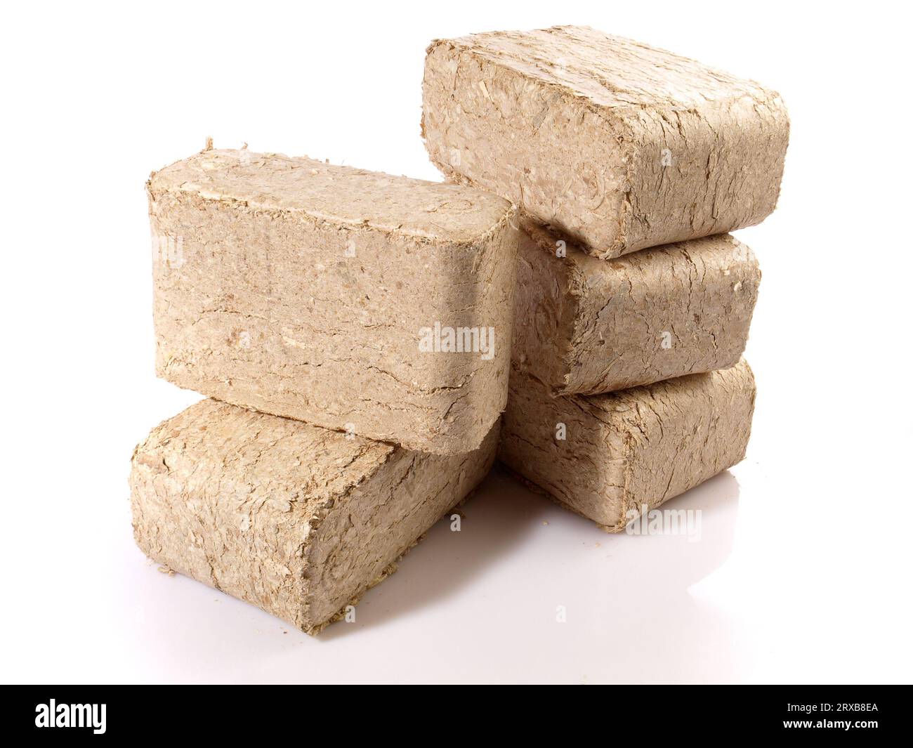 Square Sawdust Briquettes - Compressed Biomass Wood Fire Logs isolated on white Background Stock Photo