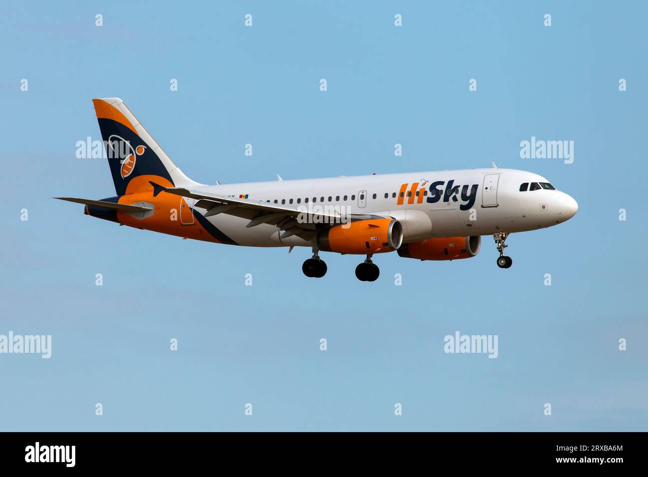 An HiSky Airbus 319 landing at Frankfurt Rhein-Main international Airport. HiSky is a Moldovan-Romanian low-cost airline headquartered in Chisinau, Moldova. The airline main bases are Chi?in?u International Airport and Henri Coand? International Airport and secondary base in Cluj-Napoca. Stock Photo