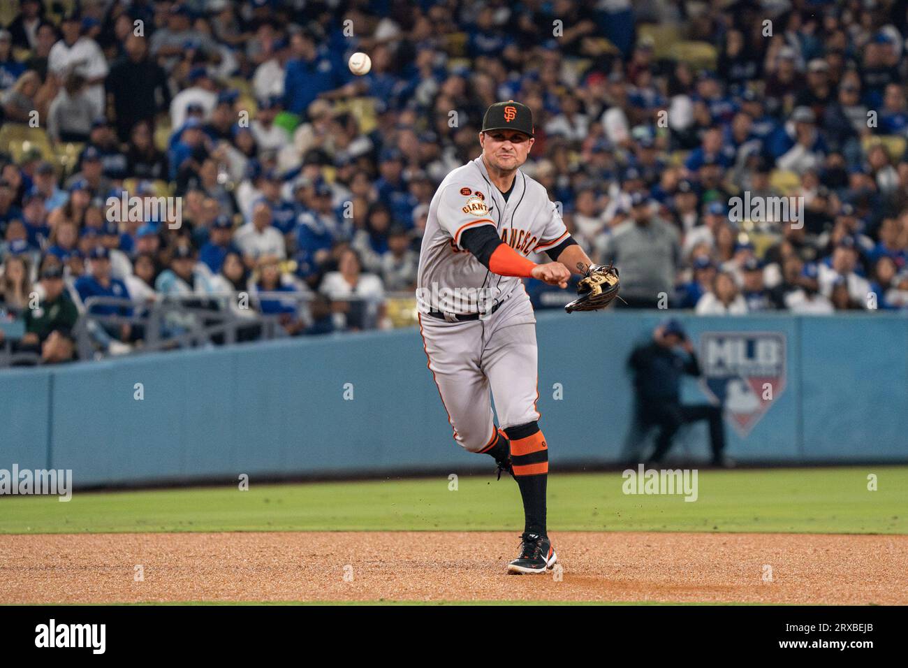 San Francisco Giants third baseman J.D. Davis (7) throws to first base