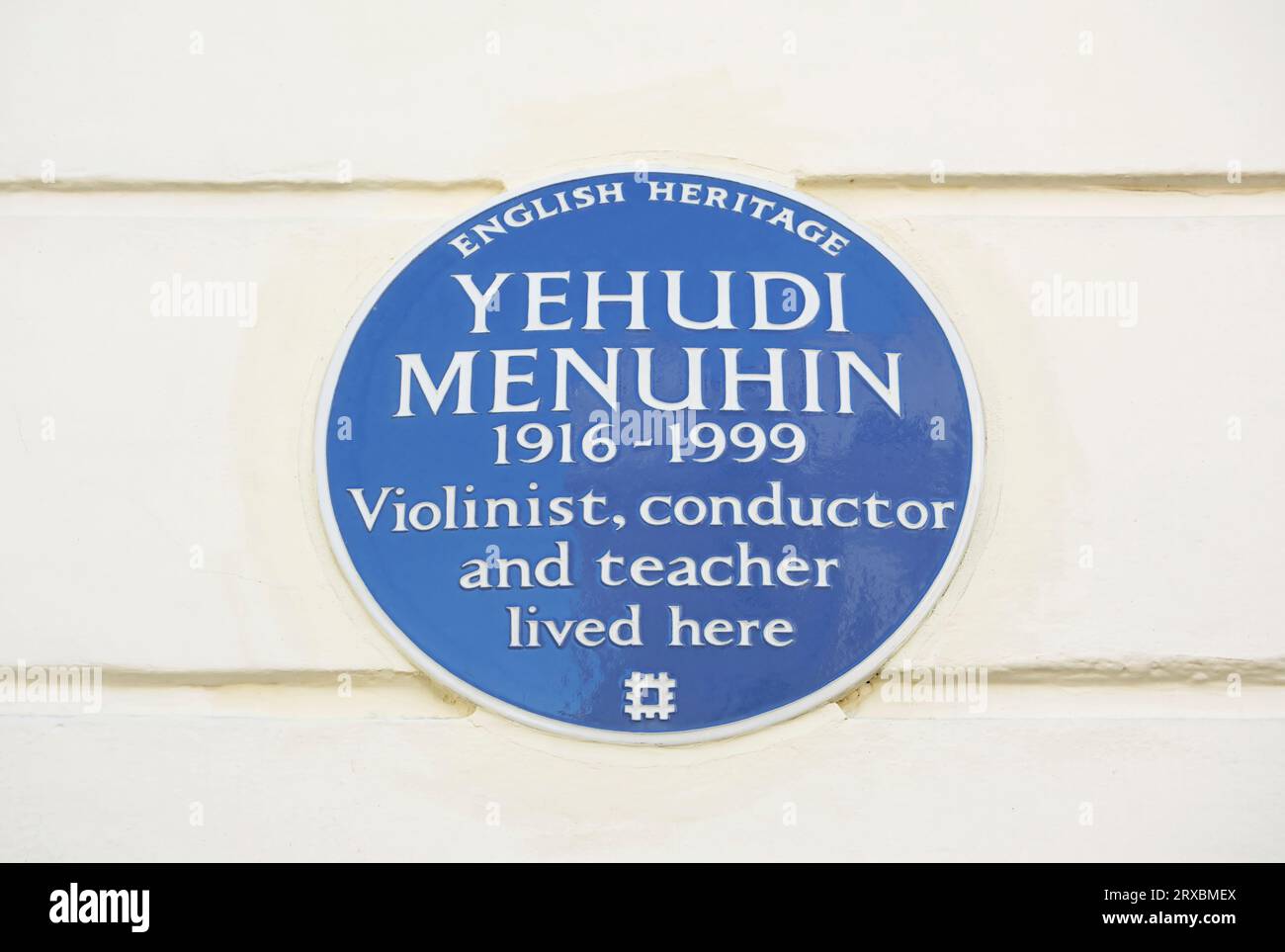 english heritage blue plaque marking a home of violinist, conductor and teacher yehudi menuhin, chester quare, london, england Stock Photo