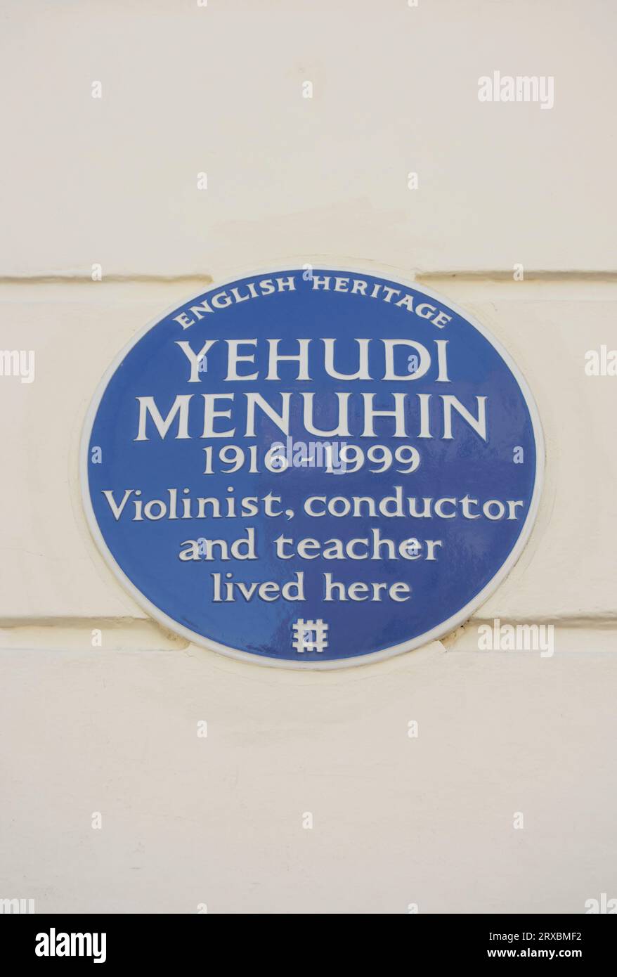 english heritage blue plaque marking a home of violinist, conductor and teacher yehudi menuhin, chester quare, london, england Stock Photo