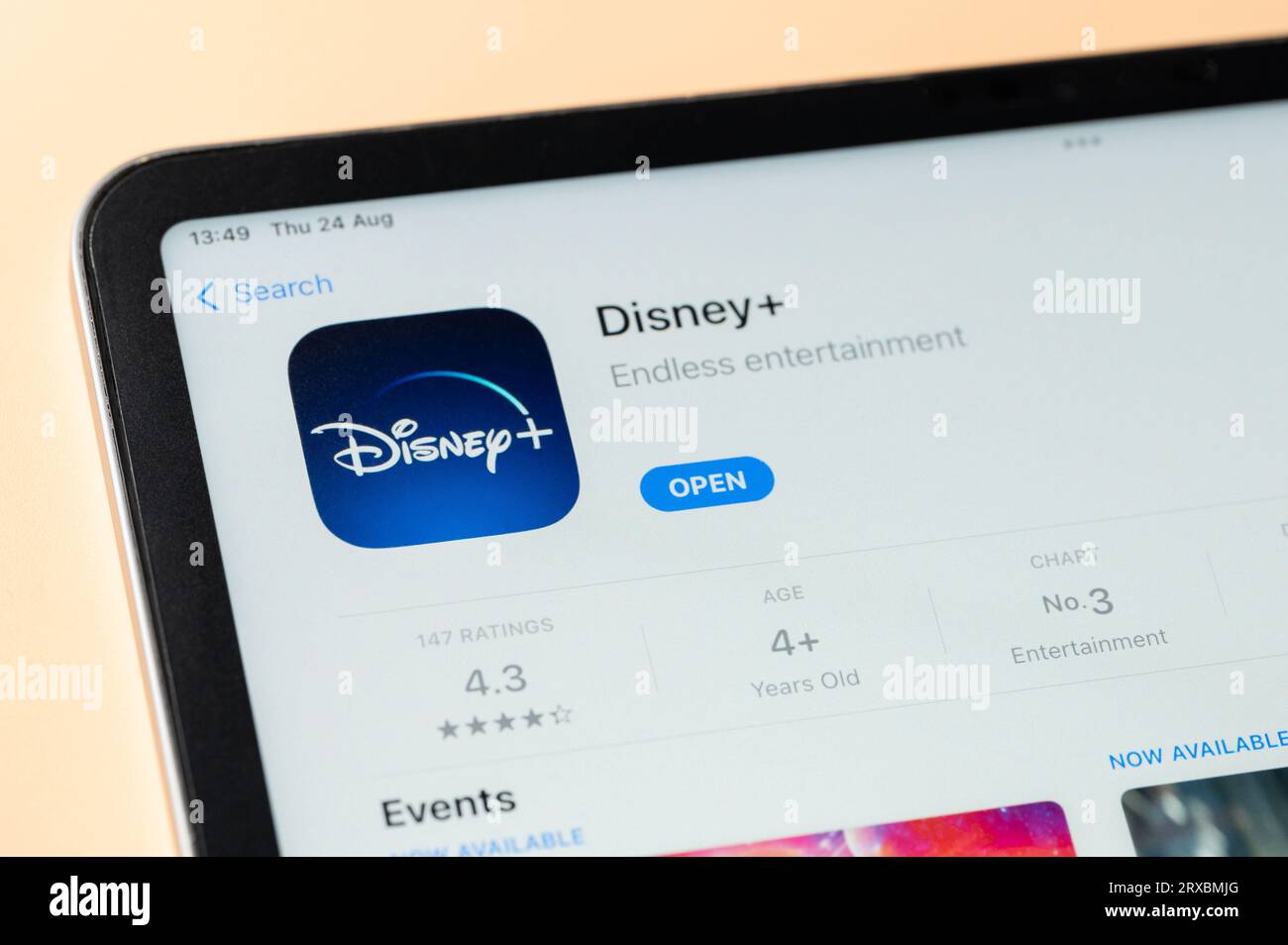 New York, USA - August 24, 2023: Disney+ app in Apple store on ipad tablet screen close up view Stock Photo