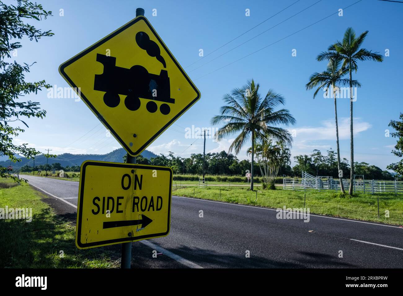 Sign warning of sugar cane trains, near El Arish, Queensland, Australia Stock Photo