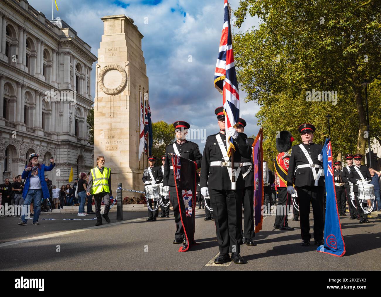 Members of the Irish protestant loyalist paramilitary Ulster Volunteer Force (UVF) display their regimental colours at the Cenotaph war memorial in Wh Stock Photo