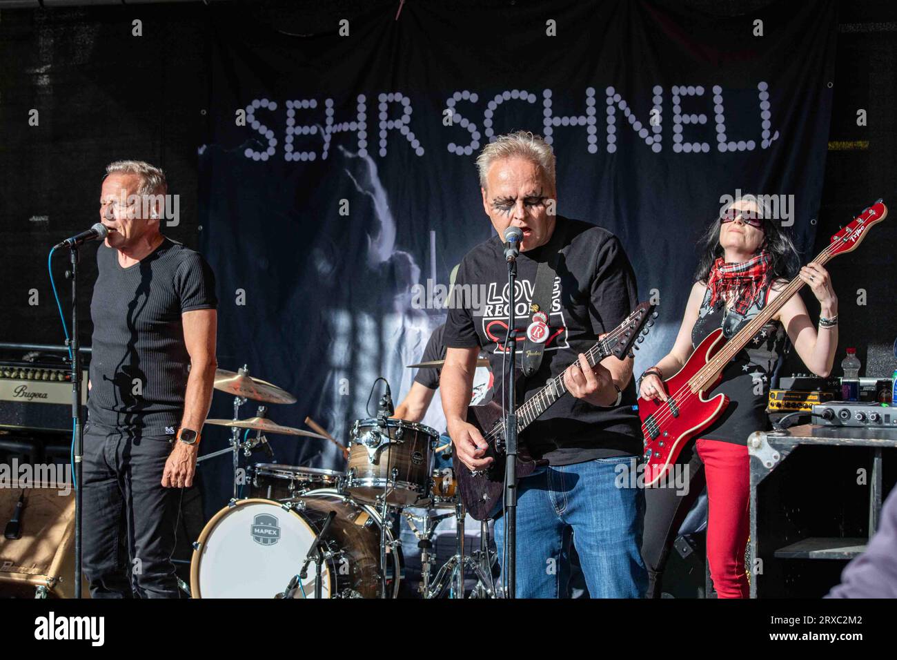 Kari Stressi Haapala, Kyösti Adi Remes and Anne Lanttola on stage with Sehr Schnell at Punk ja Yäk -festival in Turku, Finland Stock Photo