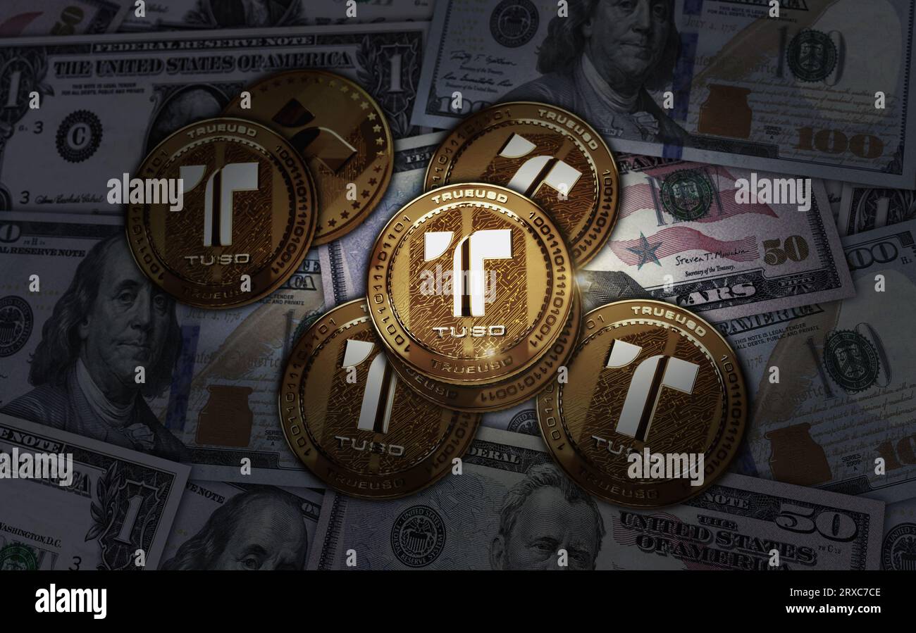 TrueUSD stablecoin TUSD cryptocurrency golden coin over Dollar banknotes. Online payment and crypto money transaction abstract concept 3d illustration Stock Photo