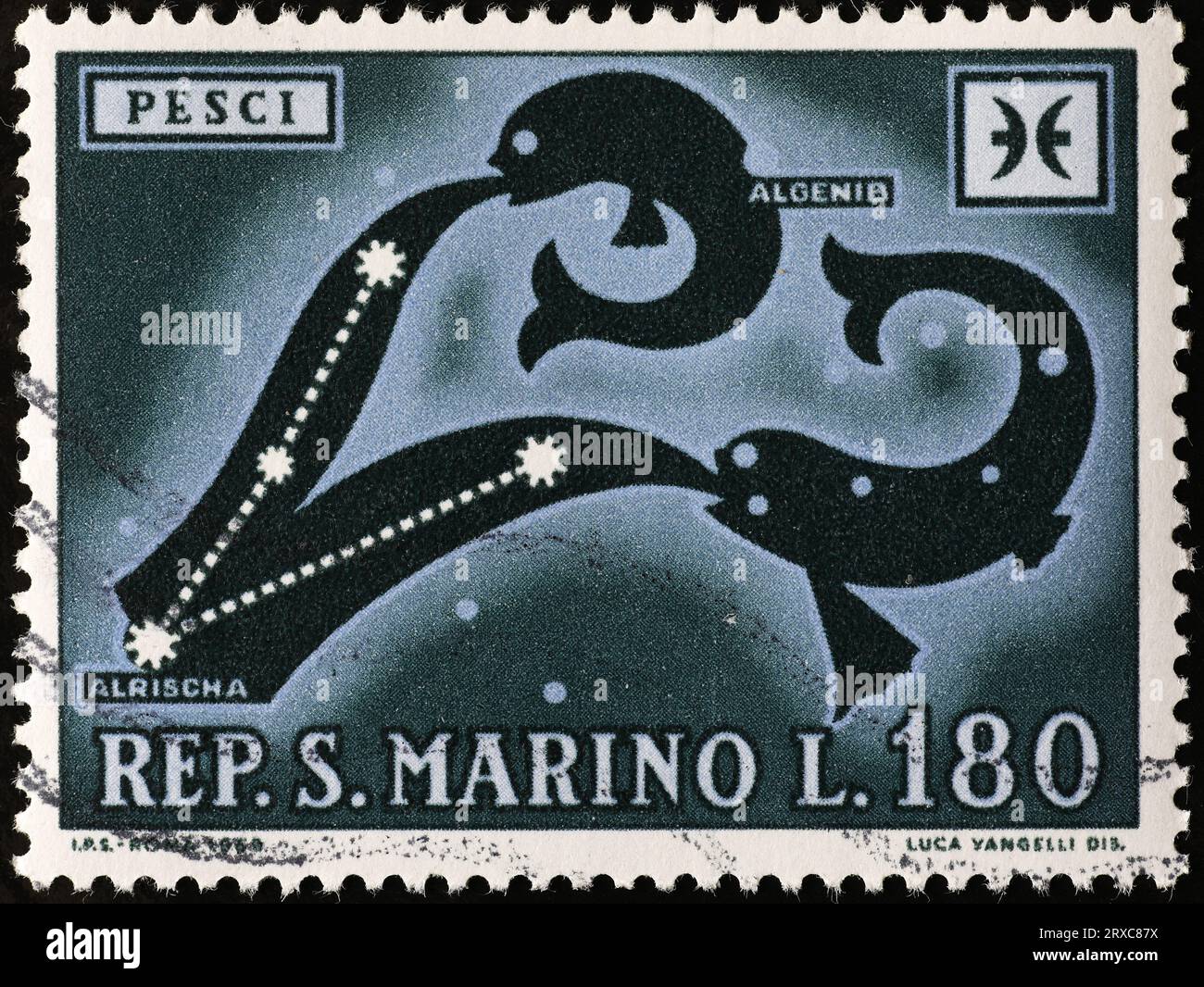 Zodiac sign of fish on postage stamp Stock Photo