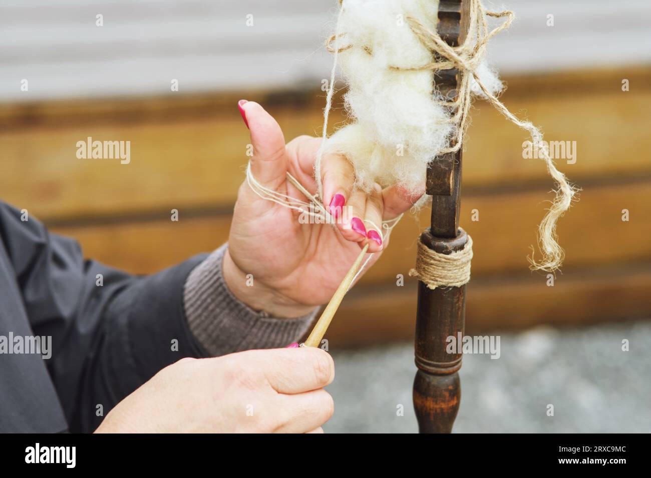 Hands spinning yarn hi-res stock photography and images - Alamy