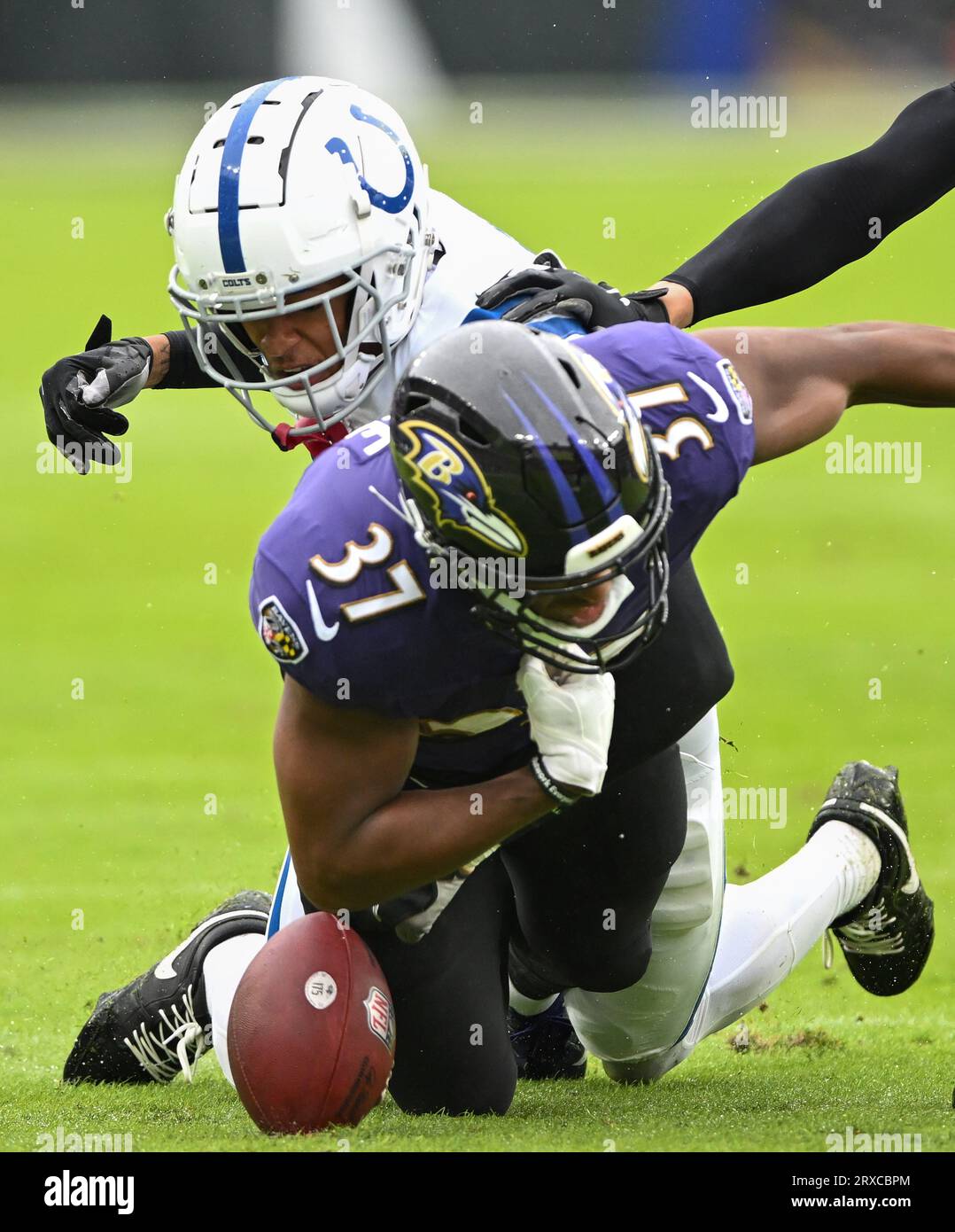 Baltimore, United States. 24th Sep, 2023. Indianapolis Colts cornerback JuJu Brents (L) forces a fumble by Baltimore Ravens running back Kenyan Drake (37) during the first half at M&T Bank Stadium in Baltimore, Maryland, on Sunday, September 24, 2023. Photo by David Tulis/UPI Credit: UPI/Alamy Live News Stock Photo
