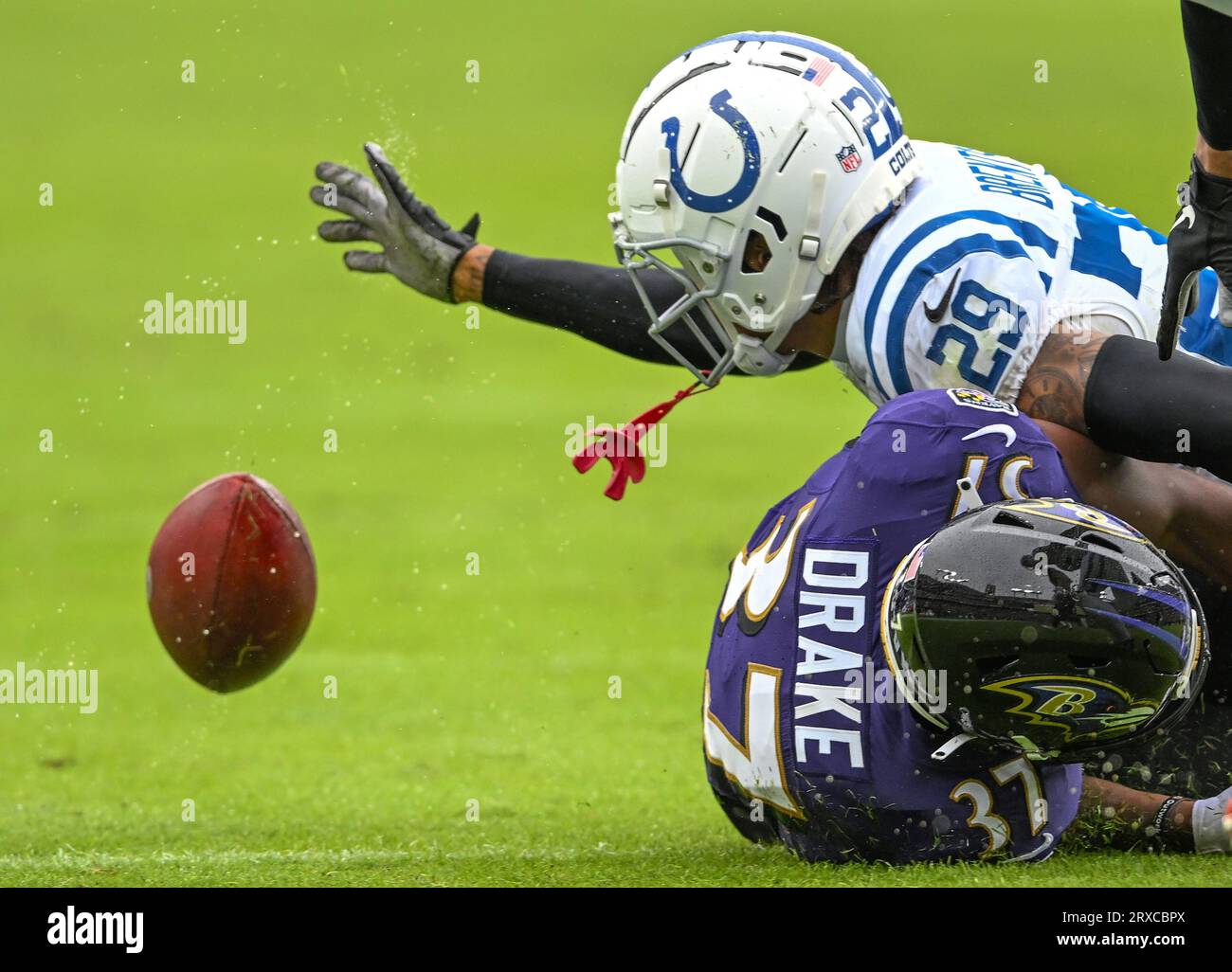 Baltimore, United States. 24th Sep, 2023. Indianapolis Colts cornerback JuJu Brents (L) recovers a fumble by Baltimore Ravens running back Kenyan Drake (37) during the first half at M&T Bank Stadium in Baltimore, Maryland, on Sunday, September 24, 2023. Photo by David Tulis/UPI Credit: UPI/Alamy Live News Stock Photo