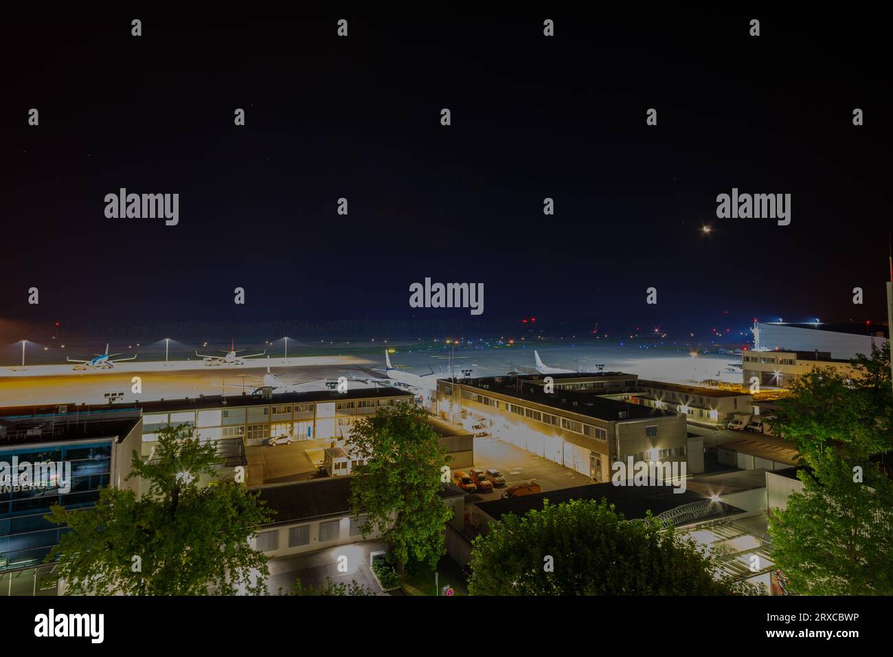 Nuremberg, Germany, September 10, 2023: Nuremberg Airport at night. view at cargo area. Nuremberg Airport (IATA: NUE, ICAO: EDDN), German: Albrecht Dü Stock Photo