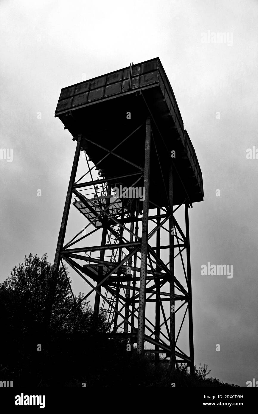 Tranwell water tower, from below, an old metal water tower stands high above the Northumbrian countryside in the village of Tranwell near Morpeth. Stock Photo