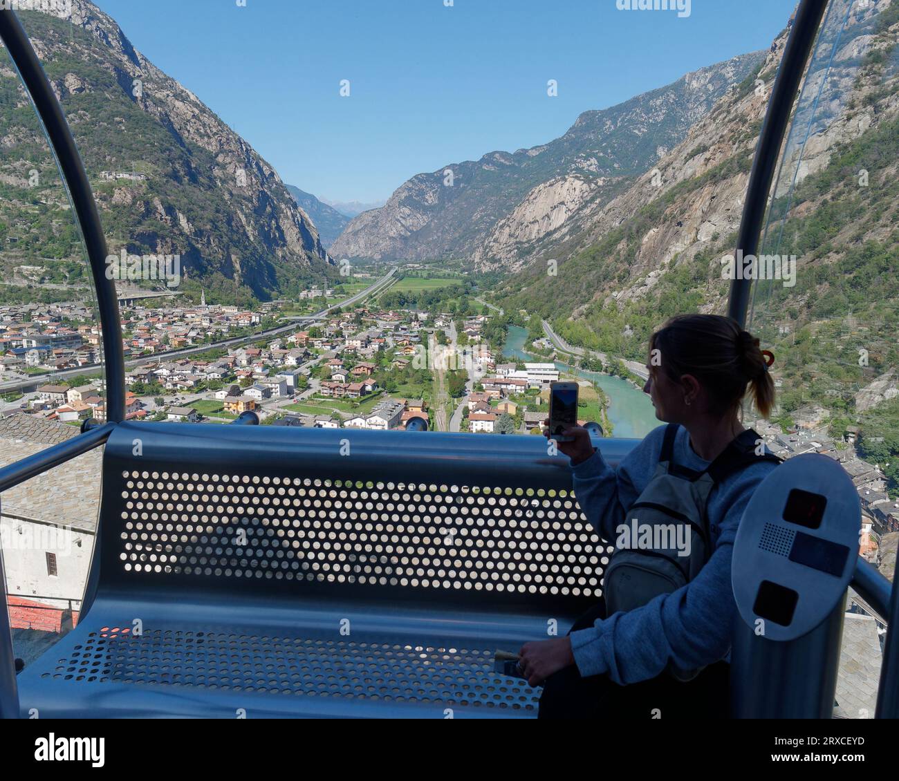 Visitor in Cable car at Forte di Bard (Fort of Bard)  with view over Dora Baltea River, Aosta Valley Region NW Italy, September 24, 2023 Stock Photo