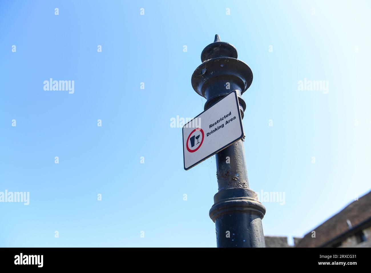 Restricted drinking area sign attached to lamppost in Southampton Hampshire England. The sign is situated outside Westquay area of the city centre. Stock Photo