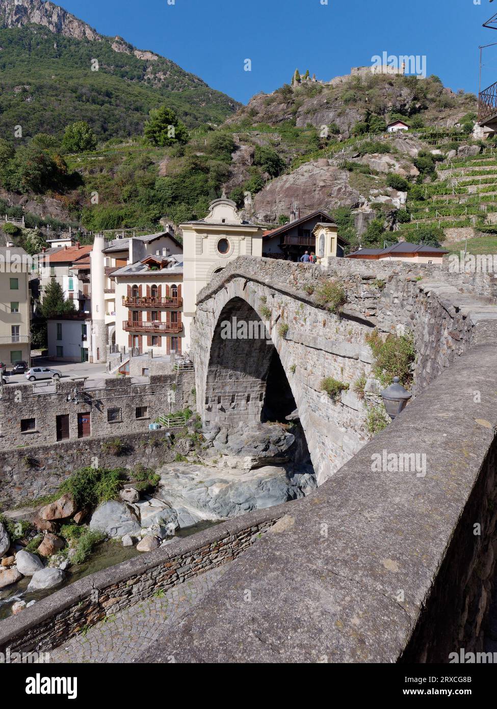 Pont-Saint-Martin a Roman Bridge over the Dora Baltea River in the town named after the bridge in the Aosta Valley Region NW Italy, September 24, 2023 Stock Photo