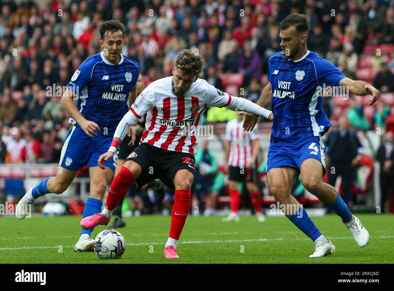 Sunderland's Adil Aouchiche With The Ball Under Pressure From Cardiff ...