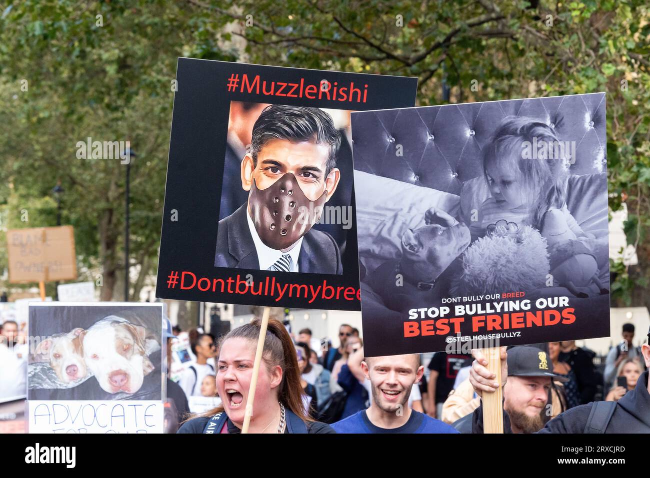 Protest against banning of XL Bully dogs in the UK by end of 2023. The XL is a variant of American Bully breed. Muzzle Rishi Sunak placard Stock Photo