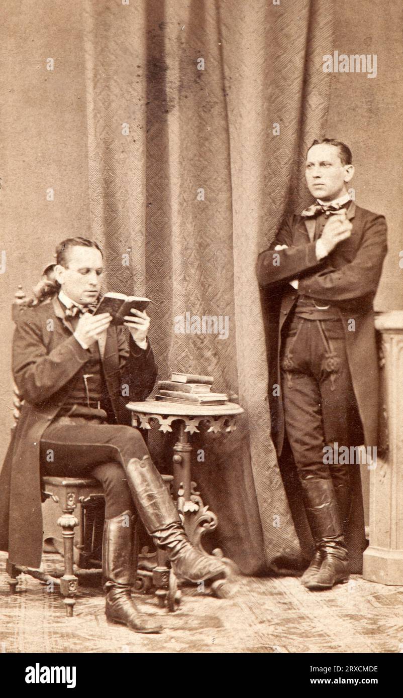 Cabinet portrait of two hungarian gentlemen during Hapsburg Empire. The photo was taken in 1867. Stock Photo