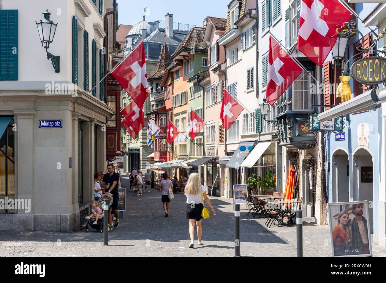 Pedestrianised street with Swiss flags, Augustinergasse, City of Zürich, Zürich, Switzerland Stock Photo