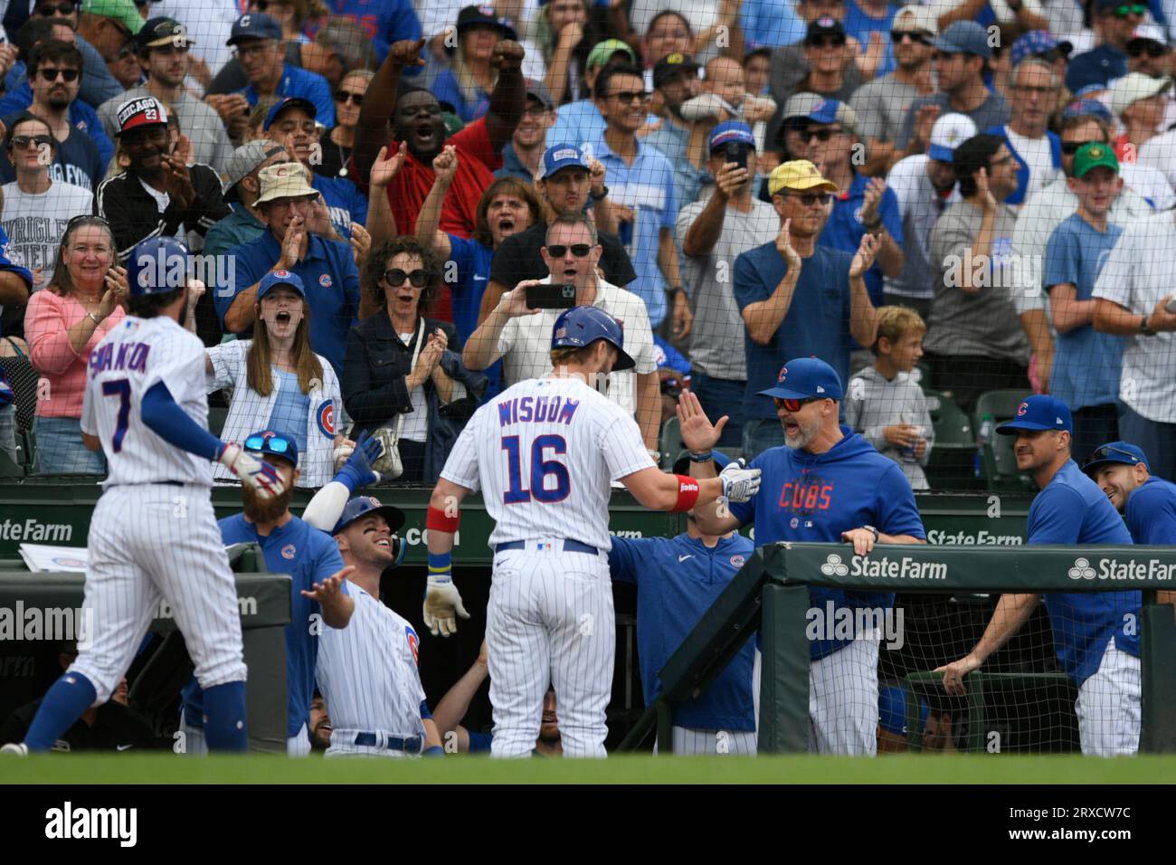 Patrick Wisdom of the Chicago Cubs hits a two run home run in the