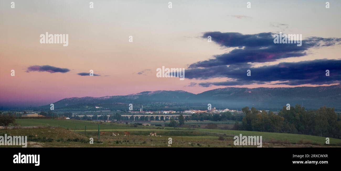 Acedera town overview at sunset. Orellana Irrigation canal Aqueduct. Vegas Altas del Guadiana, Extremadura, Spain Stock Photo