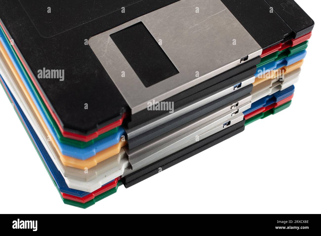 Colored old retro floppy diskettes in stack. Isolated on white background. Stock Photo