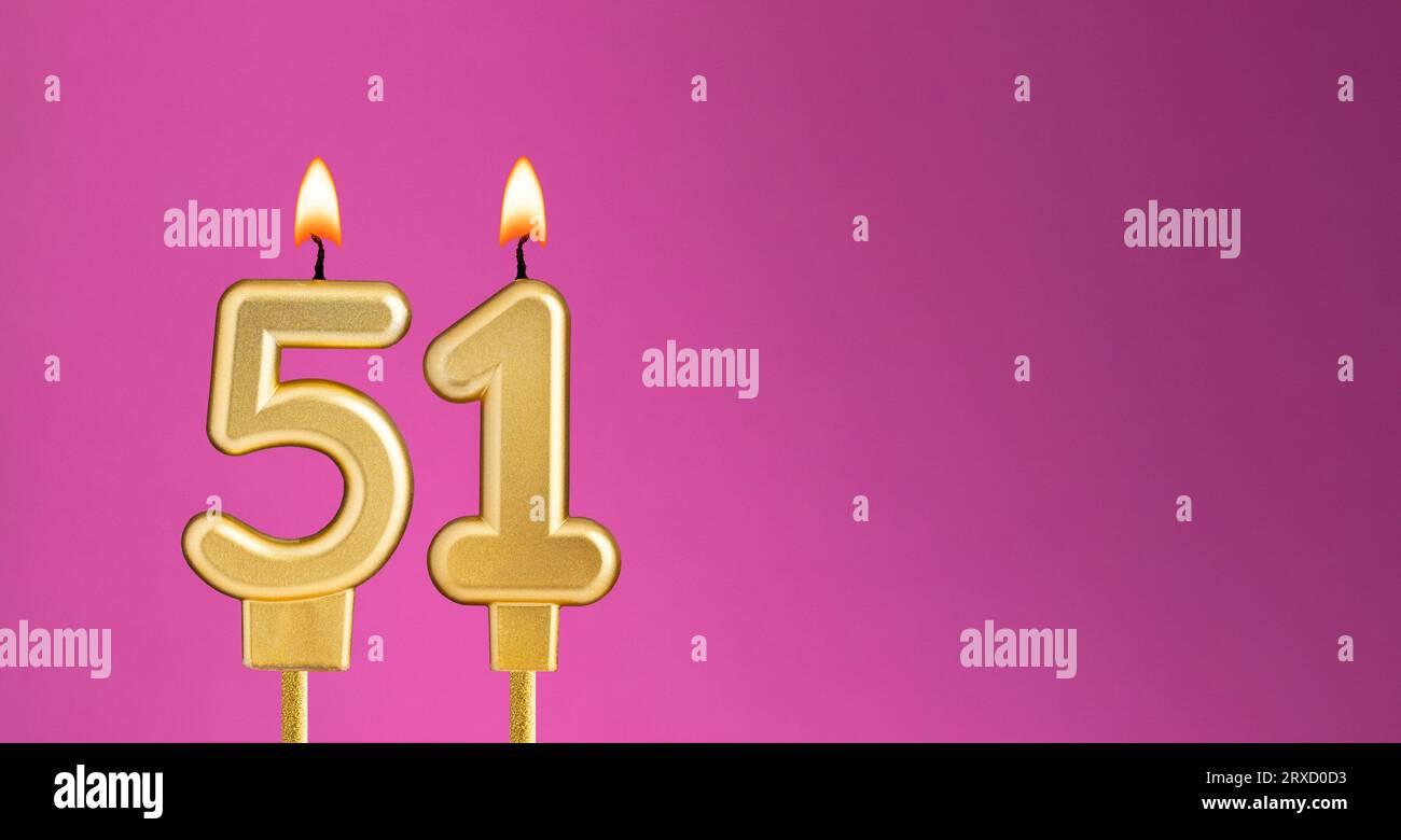 Candle number 51 in purple background - birthday card Stock Photo - Alamy