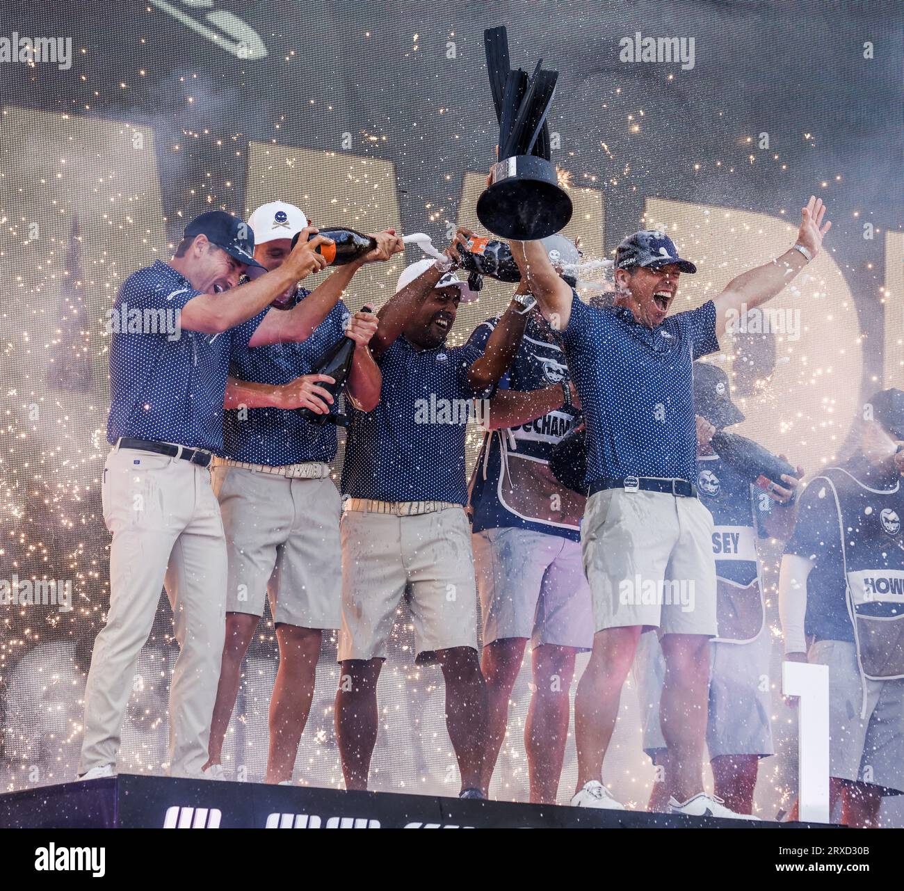 Sugar Grove, United States. 24th Sep, 2023. Paul Casey of England (R) celebrates with his teammates Charles Howell III of the US (L) Bryson DeChambeau of the US (2 L) and Anirban Lahiri of India (2R) after they won the team competition of the 2023 LIV Golf League tournament at Rich Harvest Farms in Sugar Grove, Illinois, on Sunday, September 24, 2023. Tournament play runs from September 22nd through the 24th. Photo by Tannen Maury/UPI Credit: UPI/Alamy Live News Stock Photo