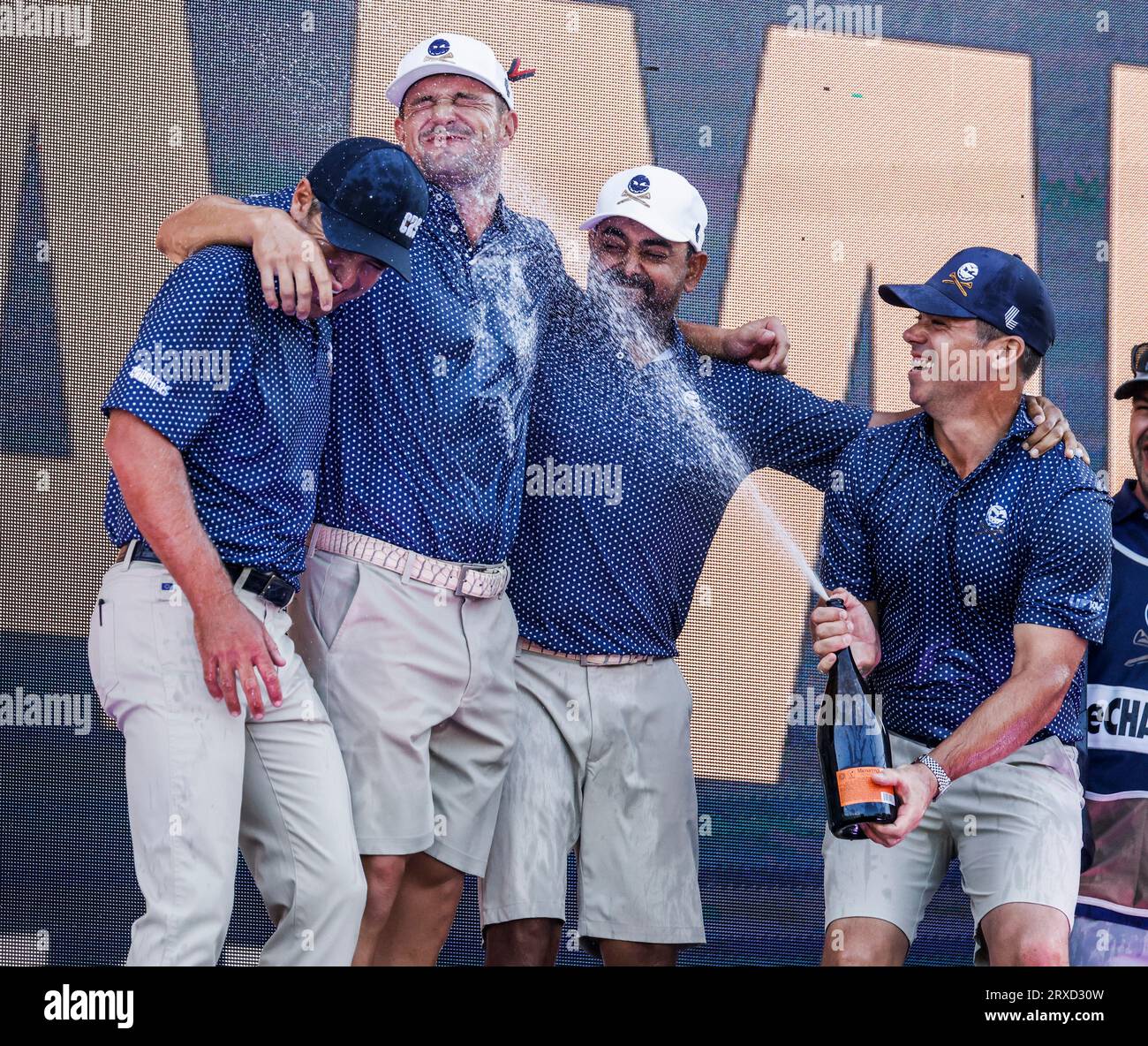 Sugar Grove, United States. 24th Sep, 2023. Paul Casey of England (R) sprays his teammages Charles Howell III of the US (L) Bryson DeChambeau of the US (2 L) and Anirban Lahiri of India (2R) after they won the team competition of the 2023 LIV Golf League tournament at Rich Harvest Farms in Sugar Grove, Illinois, on Sunday, September 24, 2023. Tournament play runs from September 22nd through the 24th. Photo by Tannen Maury/UPI Credit: UPI/Alamy Live News Stock Photo