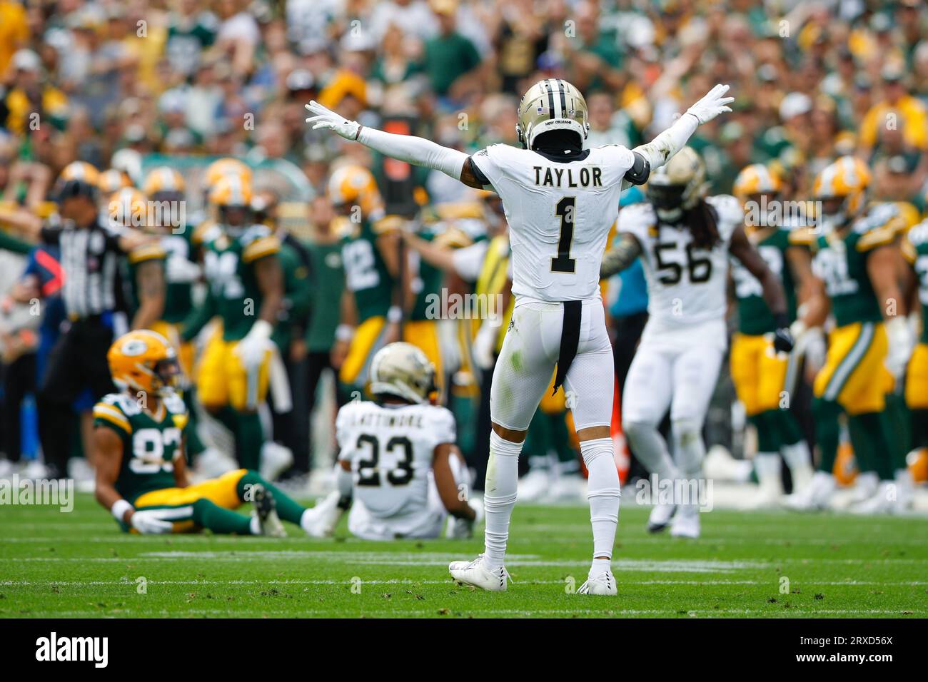 Green Bay, Wisconsin, USA. 24th Sep, 2023. New Orleans Saints cornerback Alontae Taylor (1) celebrates the pass breakup by cornerback Marshon Lattimore (23) on Green Bay Packers wide receiver Samori Toure (83) during the NFL football game between the New Orleans Saints and the Green Bay Packers at Lambeau Field in Green Bay, Wisconsin. Darren Lee/CSM/Alamy Live News Stock Photo