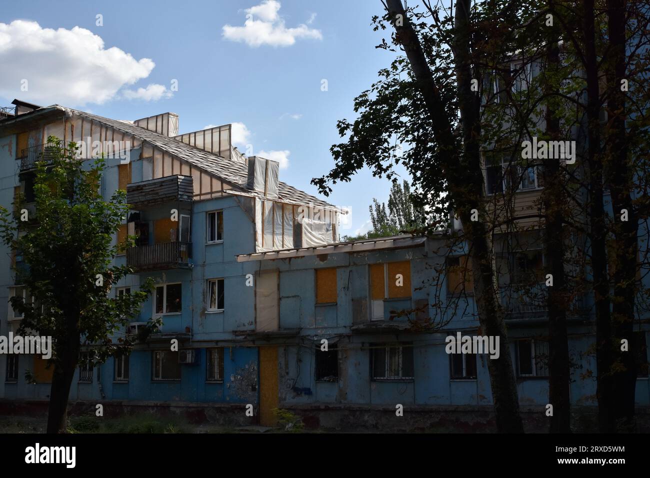 A view of the apartment building that was heavily damaged by Russian shelling in Zaporizhzhia. The commander of the Tavria group troops, Oleksandr Tarnavskyi (Ukraine), said that the Defence Forces had broken through the Russian defences in Verbove, Zaporizhzhia region. He adds that the main thing is not to lose the initiative that the Ukrainian army has now. Stock Photo