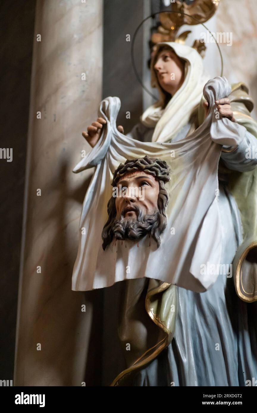 The sculpture in the church, depicting the Veil of Veronica. Stock Photo