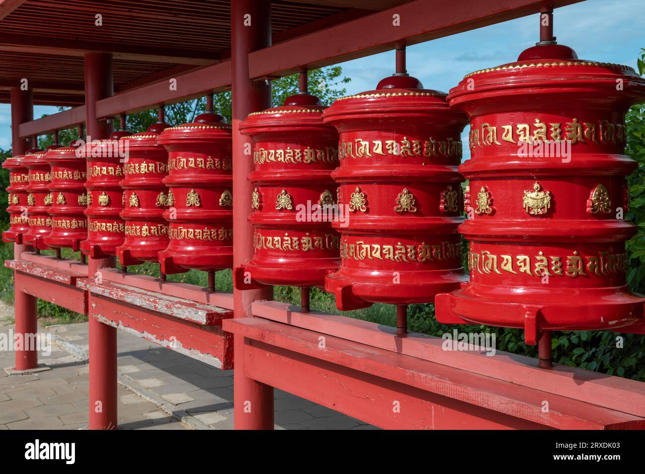 ELISTA, RUSSIA - JUNE 04, 2022: Prayer wheels of the Shakyusn-sume Buddhist temple on a sunny summer day Stock Photo
