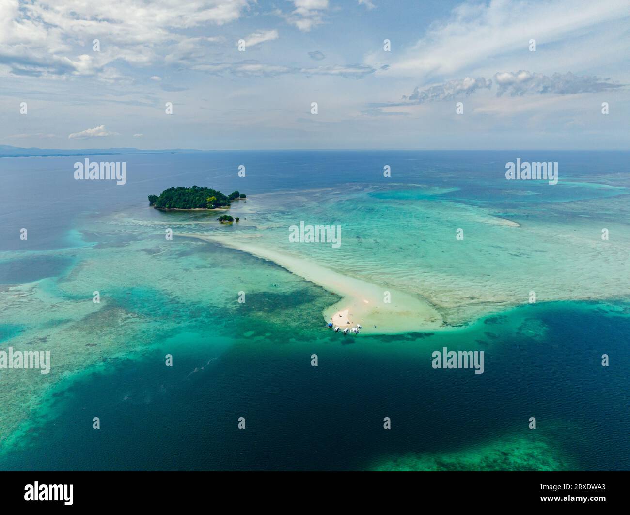 Aerial view of Sandbar and Turtle Island surrounded by azure water and reefs. Barobo, Surigao del Sur. Philippines. Stock Photo
