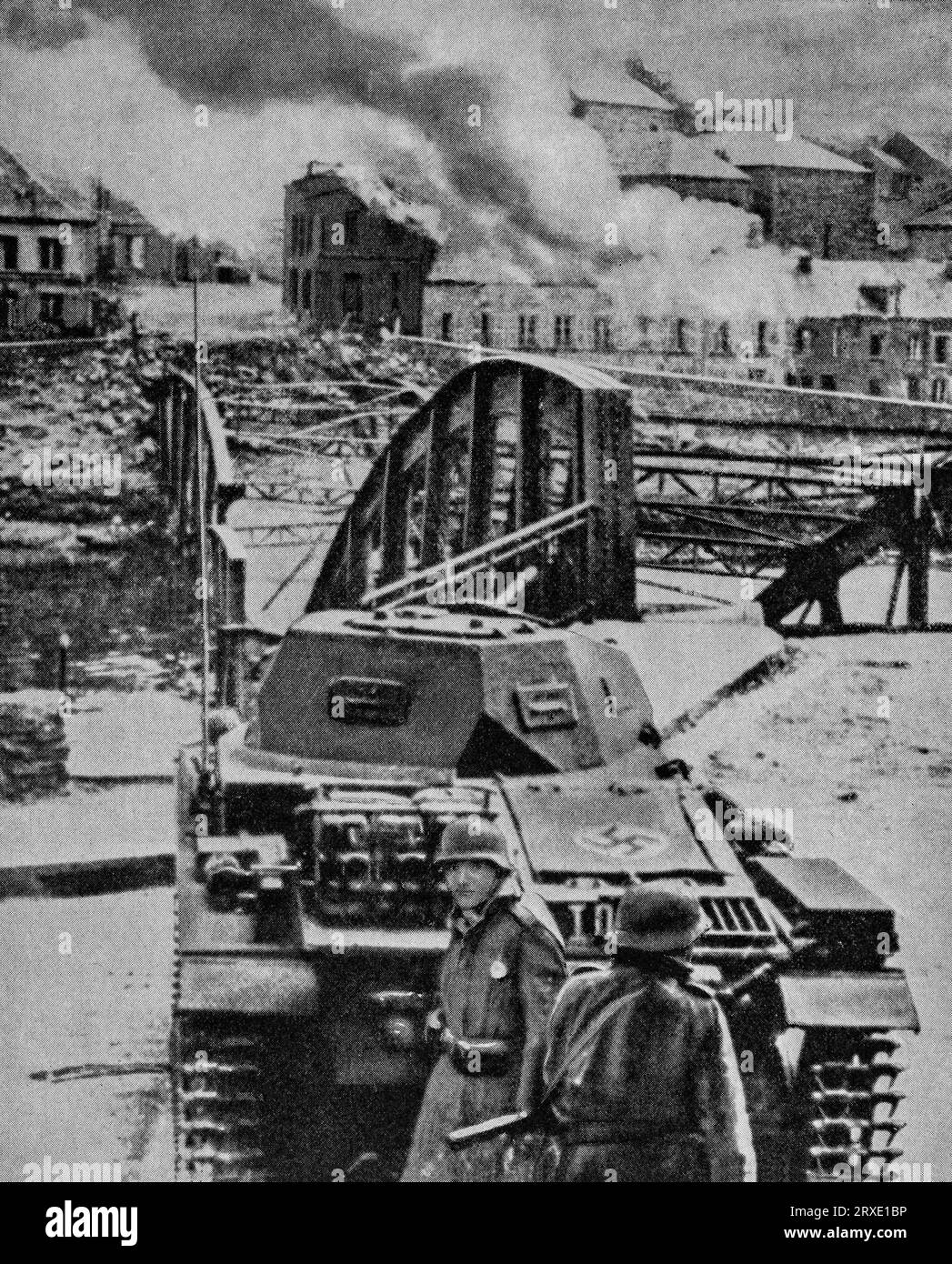 A German light tank stopped in it's tracks; when Belgian troops were forced to retreat from the German Wermacht, they destroyed bridges to slow the advance during the  Second World War. Stock Photo