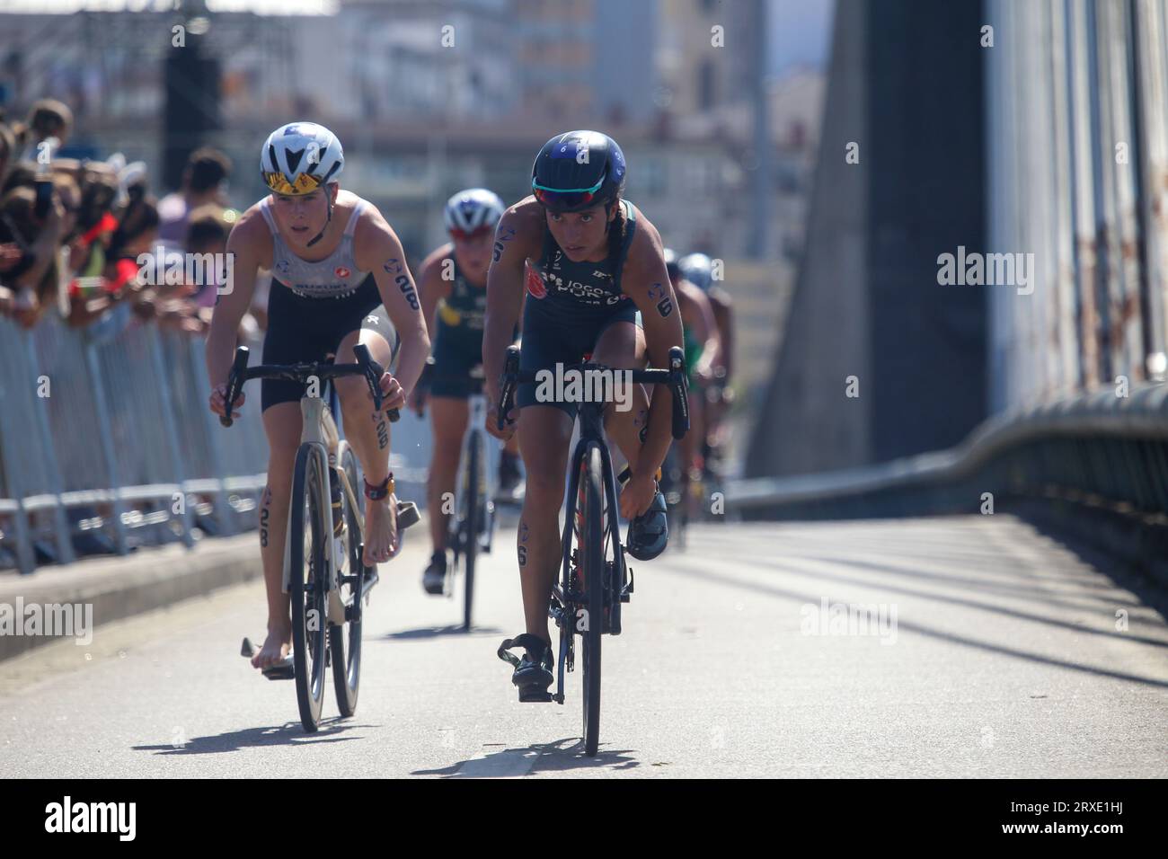 Pontevedra, Galicia, Spain. 24th Sep, 2023. Pontevedra, Spain, 24th September, 2023: The Portuguese triathlete, Maria Tomé (R) with Finja Schierl (L) in the cycling section during the 2023 Women's U23 Triathlon World Championship, on September 24, 2023, in Pontevedra, Spain. (Credit Image: © Alberto Brevers/Pacific Press via ZUMA Press Wire) EDITORIAL USAGE ONLY! Not for Commercial USAGE! Stock Photo