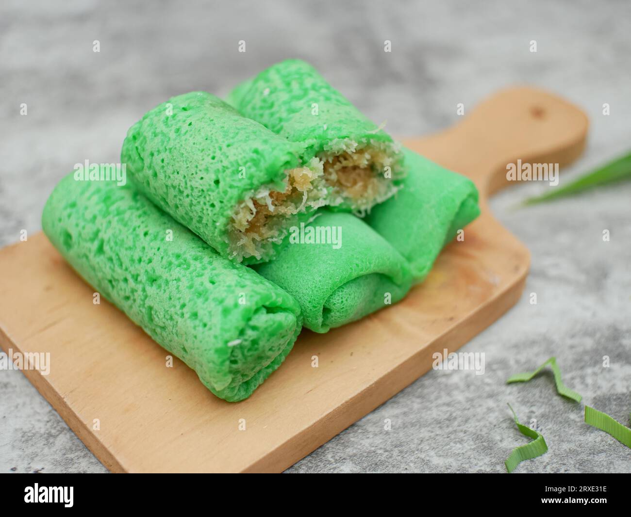 dadar gulung or sweet coconut pancakes from Indonesia, made from flour with grated coconut mixed with palm sugar Stock Photo