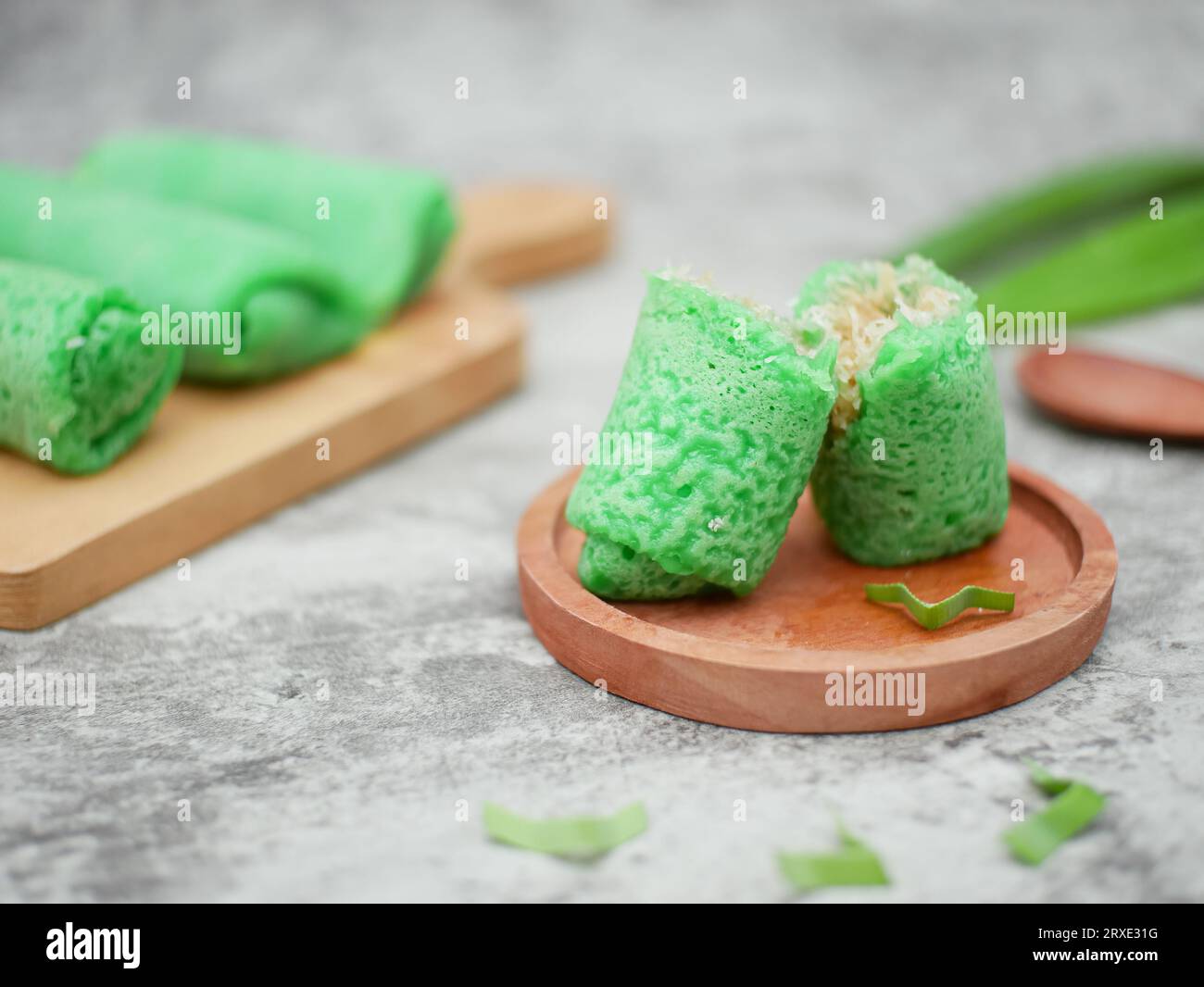 dadar gulung or sweet coconut pancakes from Indonesia, made from flour with grated coconut mixed with palm sugar Stock Photo