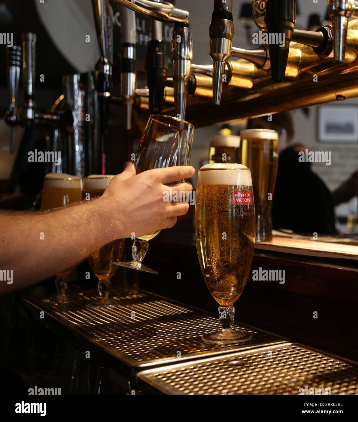 File photo dated 18/04/14 of drinks being poured at a pub, as the number of older people working part-time has reached a record high, new research suggests. Stock Photo