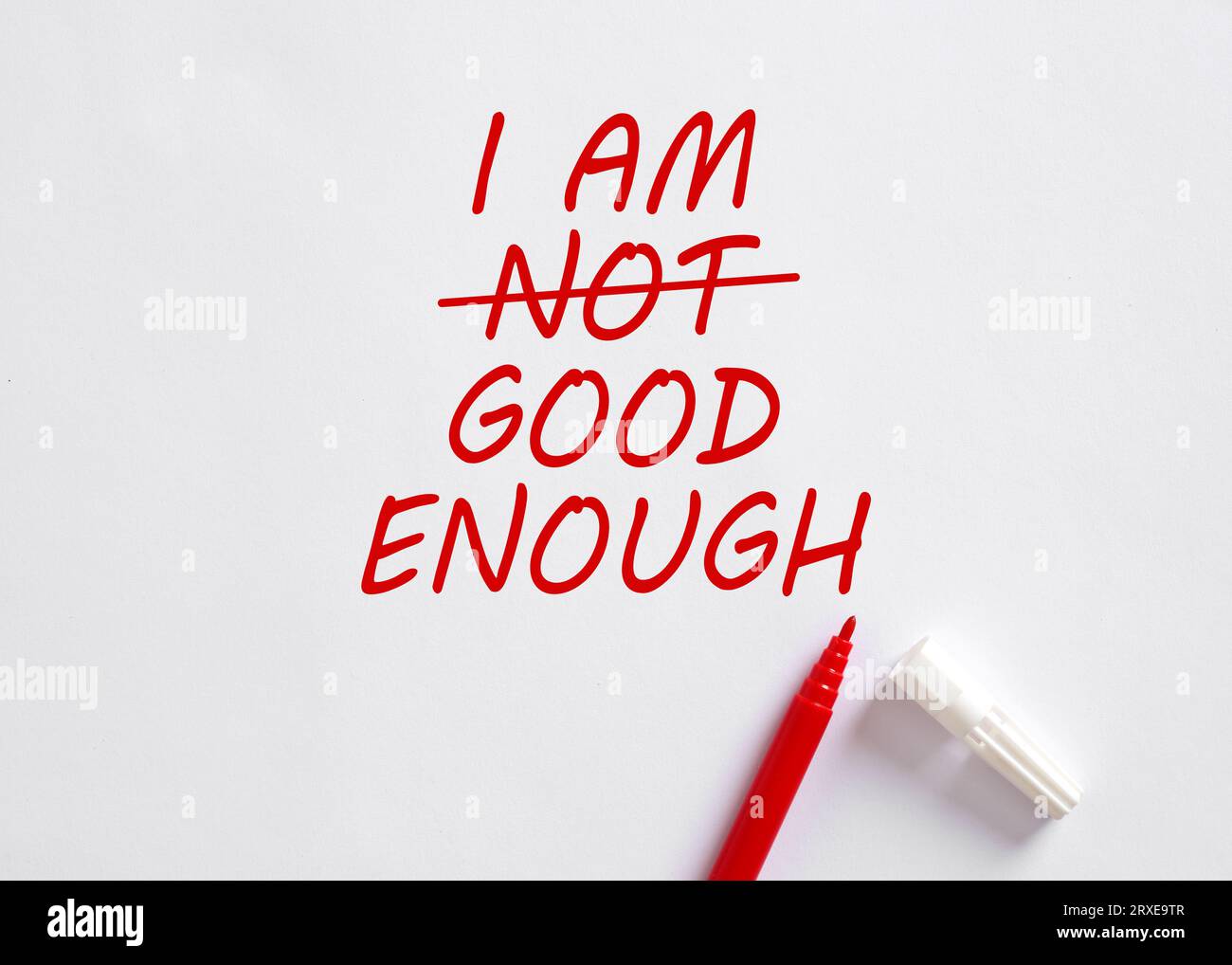 I AM NOT GOOD ENOUGH changed to I AM GOOD ENOUGH. Building self esteem, self respect and embrace personal imperfections. To overcome negative mindset. Stock Photo